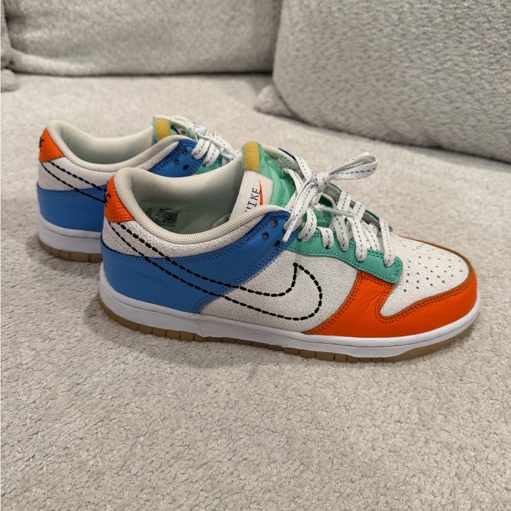 Nike Kids Orange, Blue, and Green Sneakers